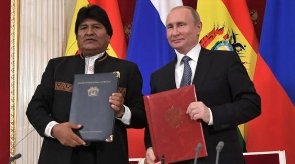 الرئيس الروسي فلادمير بويتن والبوليفي المستقيل إيفو موراليس (أرشيف)