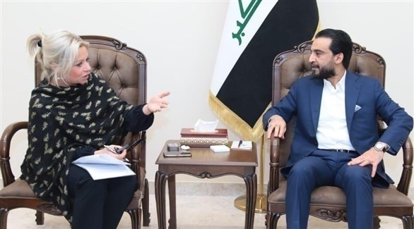 رئيس البرلمان العراقي محمد الحلبوسي وممثلة الأمم المتحدة في العراق جينين بلاسخارت (أرشيف)