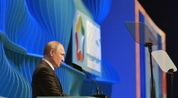 الرئيس الروسي فلاديمير بوتين يلقي كلمة خلال الحفل الختامي لمنتدى بريكس للأعمال في العاصمة البرازيلية (سبوتينك)