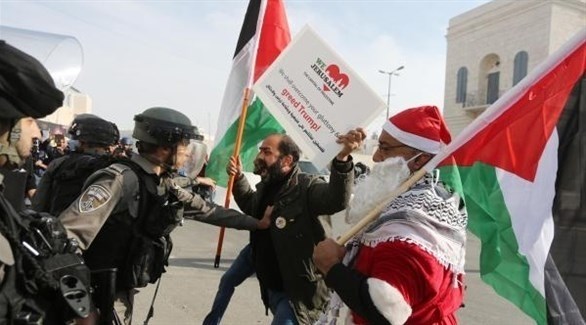 فلسطينيون يواجهون جنود الاحتلال في القدس في أعياد الميلاد (أرشيف)