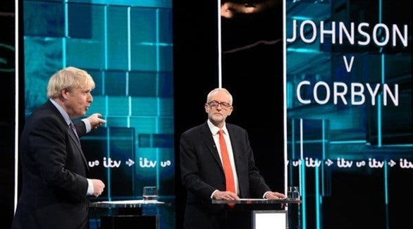 رئيس الوزراء البريطاني جونسون وزعيم حزب العمال المعارض كوربين (أرشيف)