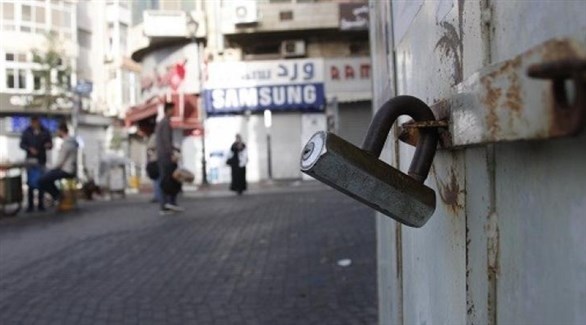 محل فلسطيني مغلق في الخليل (أرشيف)