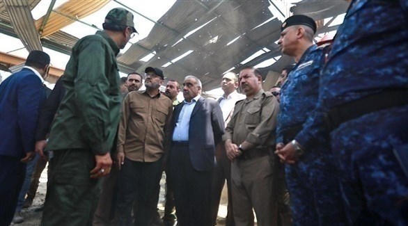 رئيس الوزراء العراقي عادل عبدالمهدي في موقع مخزن انفجر في بغداد هذا الشهر (أرشيف)