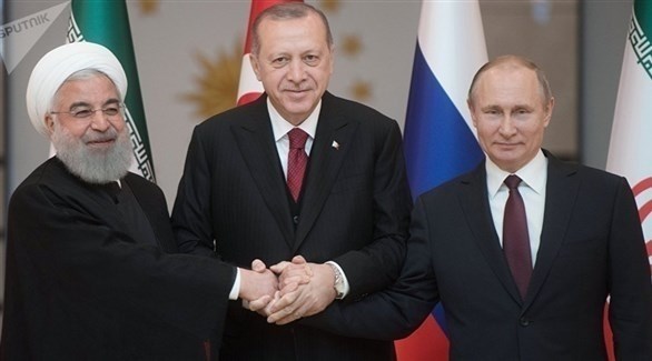 الرؤساء الروسي فلاديمير بوتين والتركي رجب طيب أردوغان والإيراني حسن روحاني (أرشيف)