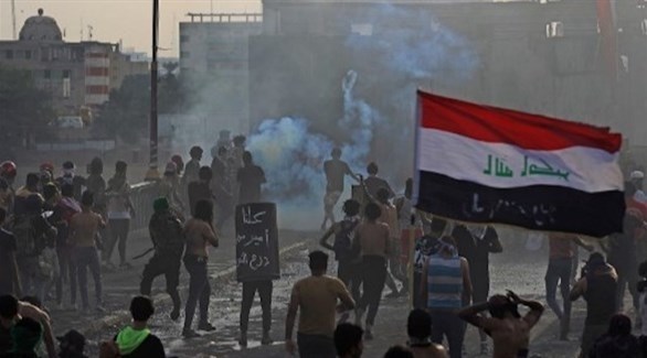 محتجون عراقيون (أ ف ب)
