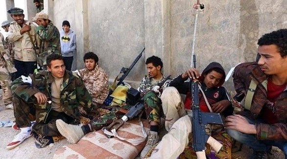 مسلحون من إحدى الميليشيات الليبية في طرابلس (أرشيف)