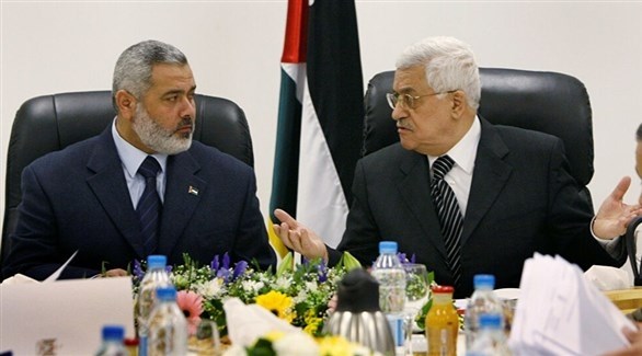 الرئيس الفلسطيني محمود عباس وزعيم حركة حماس إسماعيل هنية (أرشيف)