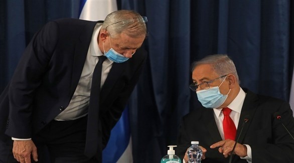 رئيس الوزراء الإسرائيلي بنيامين نتانياهو  ووزير دفاعه بيني غانتس (أرشيف)