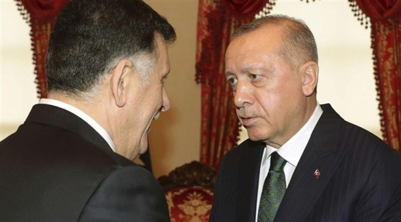 الرئيس التركي رجب طيب اردوغان ورئيس حكومة الوفاق الوطني الليبية فايز السراج.(أرشيف)