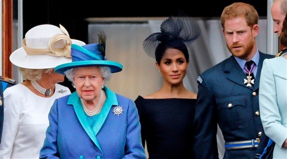 الأمير هاري وزوجته إلى جانب الملكة (أرشيف/  أ ف ب)