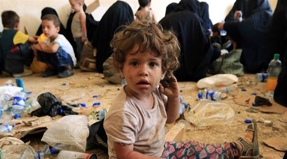 أطفال ونساء مقاتلي داعش في مخيم للاجئين (أرشيف)