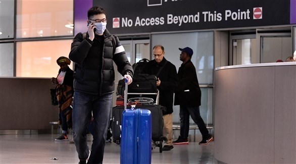 مسافر صيني في مطار بوسطن الأمريكي (أرشيف)