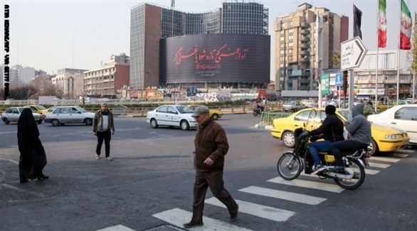 إيرانيون في أحد شوارع العاصمة طهران (أرشيف)
