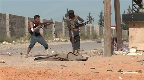 مسلحان من الميليشيات الموالية لحكومة الوفاق في طرابلس (أرشيف)