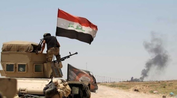 جندي عراقي فوق مُدرعة قرب الحدود السورية (أرشيف)