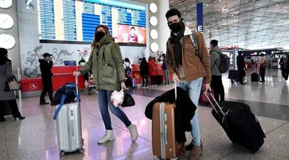 مسافرون في مطار صيني (أرشيف)
