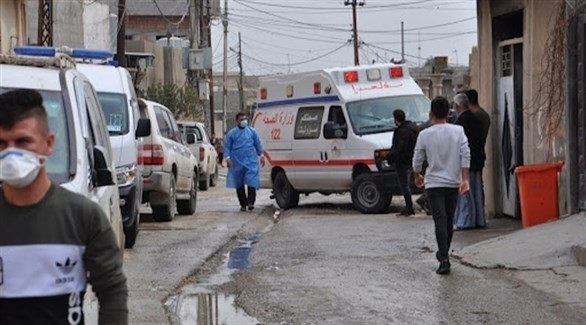 مركبة إسعاف عراقية تستعد لنقل مصاب بكورونا للمشفى (أرشيف)