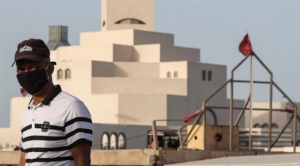 عامل وافد في الدوحة (أ ف ب)