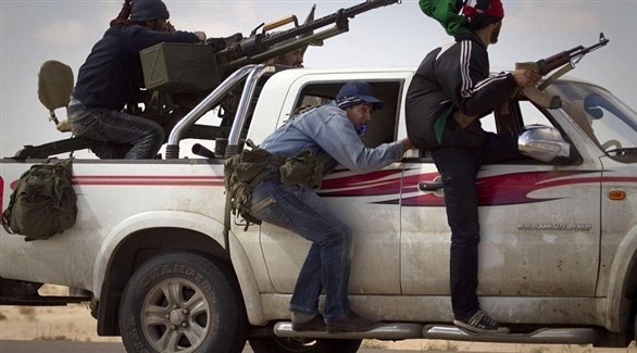 مسلحون من إحدى الميليشيات الموالية للوفاق في طرابلس (أرشيف)