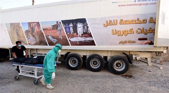 شاحنة لنقل جثث الموتى بكورونا في العراق (إ ب أ)
