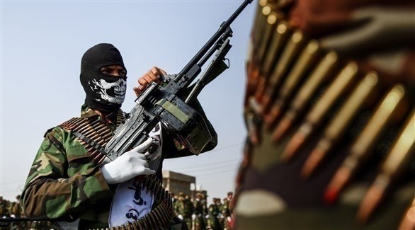 مسلح من إحدى الميليشيات الإرهابية الموالية لإيران في العراق (أرشيف)