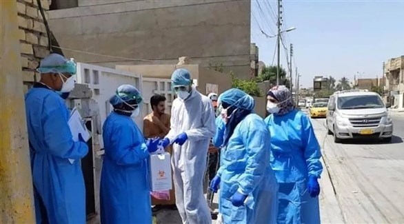عاملون في القطاع الصحي العراقي في بغداد (أرشيف)