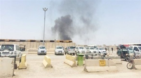 تصاعد عمود دخان في قاعدة التاجي ببغداد (أرشيف)