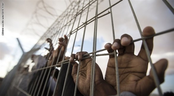 أشخاص داخل السجون (أرشيف / غيتي)