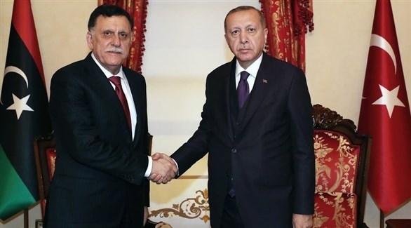 الرئيس التركي رجب طيب أردوغان ورئيس حكومة الوفاق الليبية فائز السراج (أرشيف)