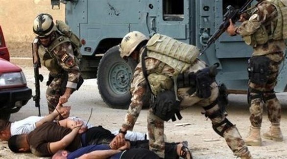 عناصر من الأمن تعتقل إرهابيين من داعش (أرشيف)