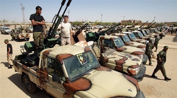 مسلحون ومركبات عسكرية في ليبيا (أرشيف)