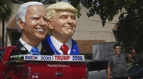 منحوتتان لوجهي الرئيس الأمريكي ترامب وغريمه جو بايدن (أرشيف)