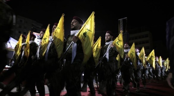 عناصر من حزب الله خلال مسيرة استعراضية في بيروت (أرشيف / أ ب)