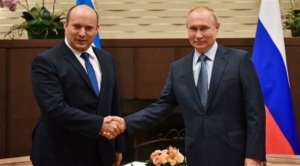 الرئيس الروسي فلاديمير بوتين ورئيس الوزراء الإسرائيلي نافتالي بينيت (رويترز)