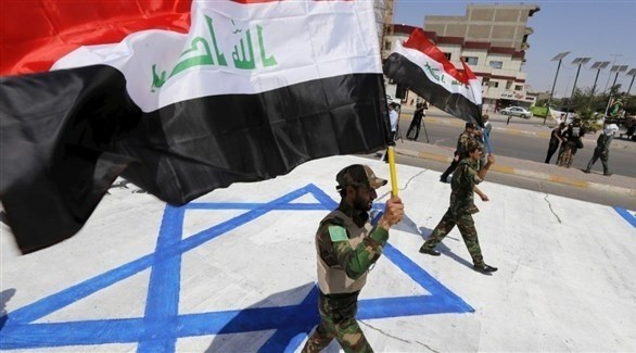 عراقيون من ميليشيا مؤيدة لإيران يتظاهرون ضد إسرائيل (أرشيف)