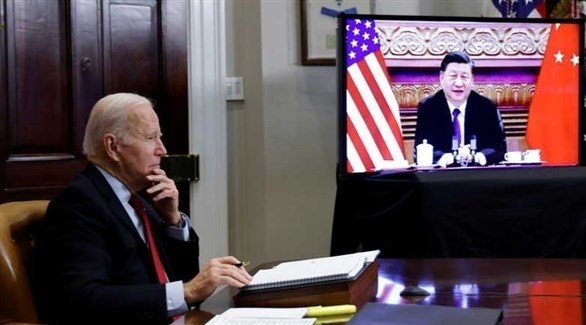الرئيسان الأمريكي جو بايدن والصيني شي جين بينغ خلال القمة الافتراضية (رويترز)