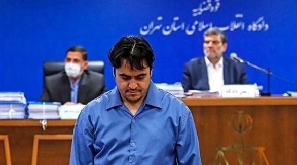 المعارض الإيراني روح الله زم في المحكمة قبل إعدامه (أرشيف)