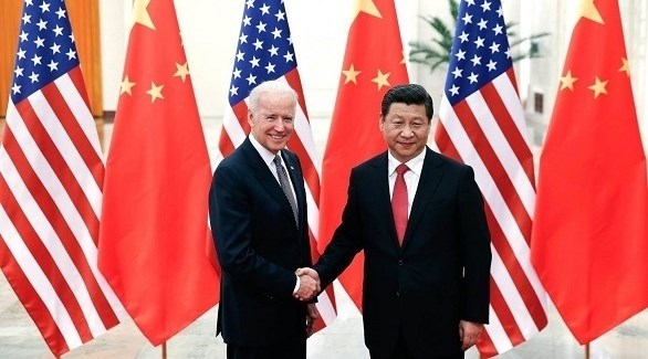 الرئيسان الصيني شي جين بينغ و الأمريكي المنتخب جو بايدن (أرشيف)