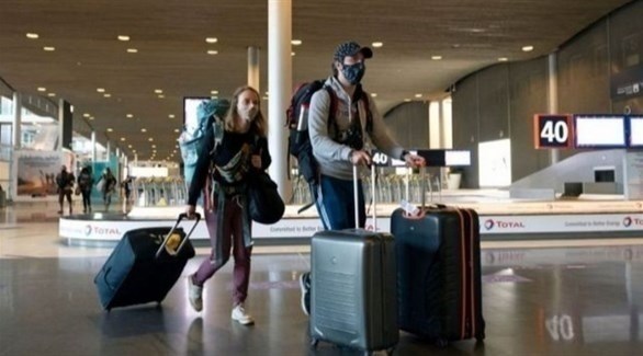 مسافرون في مطار شارل ديغول الدولي (أرشيف)