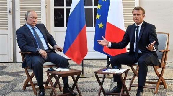 الرئيسان الفرنسي إيمانويل ماكرون والروسي فلاديمير بوتين (رويترز)