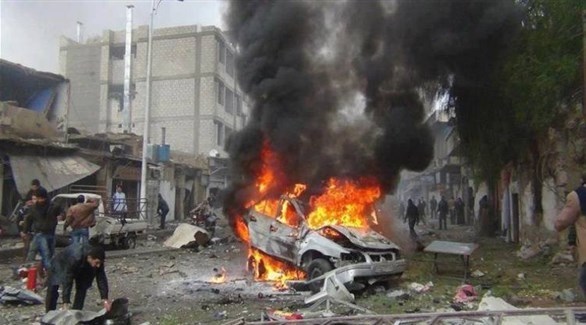 سيارة تشتعل في بغداد بعد تفجير إرهابي سابق (أرشيف)
