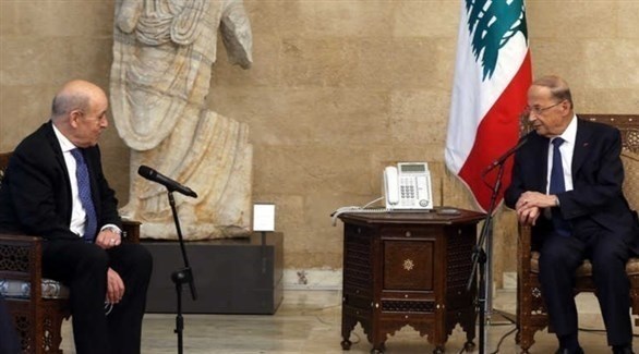 الرئيس اللبناني ميشال عون ووزير الخارجية الفرنسي جان إيف لودريان (أ ف ب)