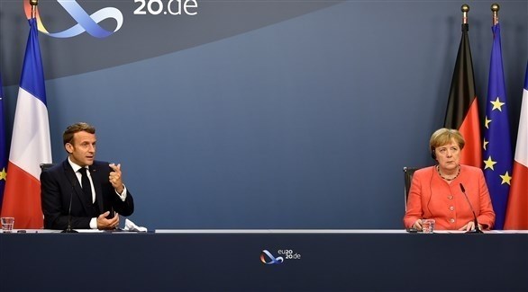 المستشارة الألمانية انجيلا ميركل والرئيس الفرنسي إيمانويل ماكرون (أرشيف)