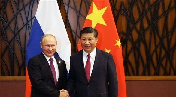 الرئيس الروسي بوتين ونظيره الصيني شي (أرشيف)