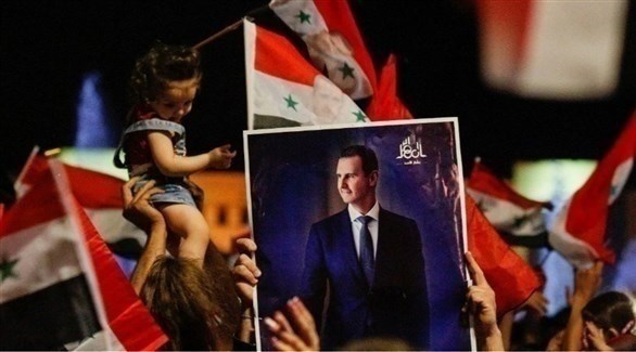تظاهرة مؤيدة للرئيس السوري بشار الأسد.(أرشيف)