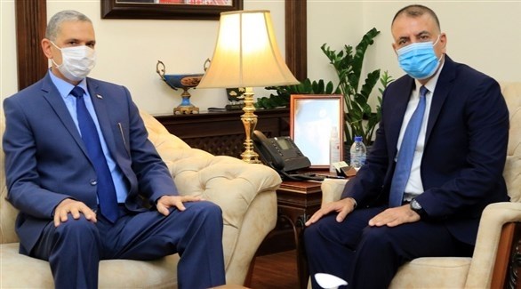 وزيرا الداخلية الأردني مازن الفراية ونظيره العراقي عثمان الغانمي (بترا)