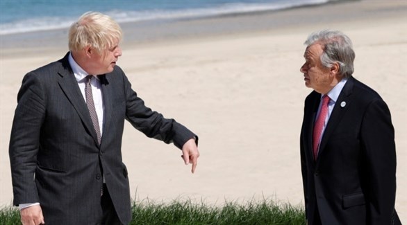 الأمين العام للأمم المتحدة غوتيريش ورئيس الوزراء البريطاني جونسون (أرشيف)