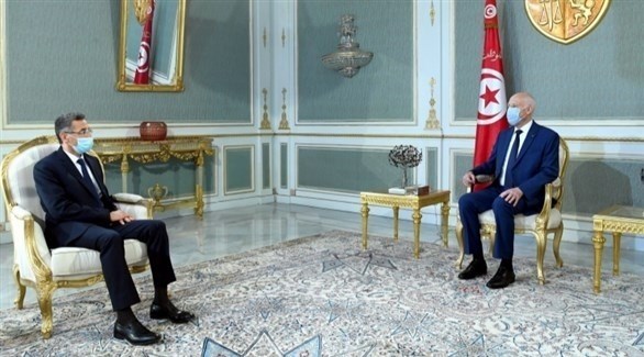 الرئيس التونسي قيس سعيّد ووزير الداخلية السابق توفيق شرف الدين (أرشيف)