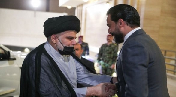 رئيس البرلمان العراقي محمد الحبلوسي وزعيم التيار الصدري مقتدى الصدر (أرشيف)