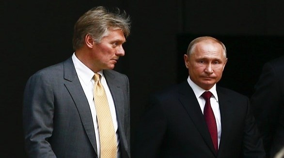 المتحدث باسم الكرملين ديمتري بيسكوف والرئيس فلاديمير بوتين (أرشيف)